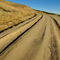 Rf-alpujarra-dirt-road-mountain-tussock-winding-adl0768