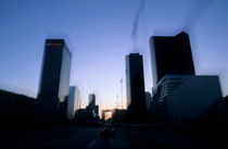 Skyscrapers of La Défense seen from a moving vehicle von Sami Sarkis Photography