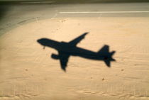 Shadow of airplane flying into land at Hurghada Airport von Sami Sarkis Photography