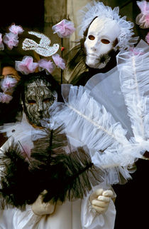 Portrait of two people wearing Venetian masks and costumes by Sami Sarkis Photography