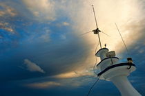 Antennas of a diver's cruise boat at sunset by Sami Sarkis Photography