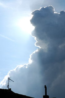 Clouds and sunlight in the sky following a storm by Sami Sarkis Photography