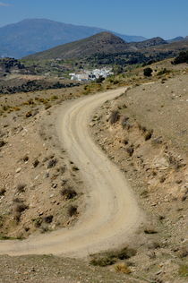 Dirt road winding above Capileira village in the Alpujarras mountains von Sami Sarkis Photography