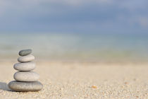 Stack of pebbles on beach von Sami Sarkis Photography