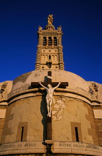 Christ on the cross outside the Nortre Dame De La Garde at sunset von Sami Sarkis Photography
