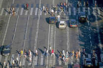 Pedestrians on a zebra crossing on the Champs-...lysÈes by Sami Sarkis Photography