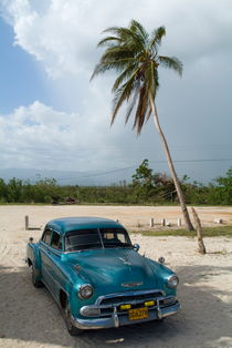 Classic American car parked at Ancon Beach near Trinidad by Sami Sarkis Photography