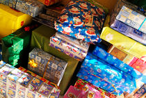 Pile of Christmas presents. by Sami Sarkis Photography