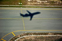 Shadow of an airplane taking off. by Sami Sarkis Photography