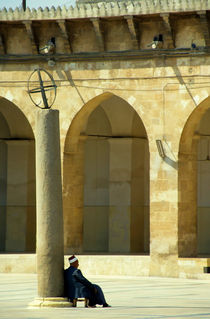 Man sitting inside the Great Mosque of Aleppo by Sami Sarkis Photography