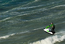 Man jumping on waves with jet-ski by Sami Sarkis Photography