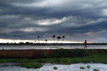 Boy Walking in a Storm Kerala von serenityphotography