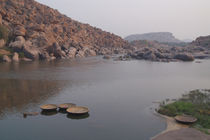 Coracles on the Tungabhadra River by serenityphotography