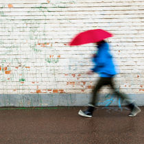 Walking in the rain by Lars Hallstrom