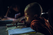 A little monk studying by Thomas Cristofoletti